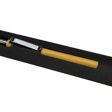 A black rectangular pen holder or sleeve containing a yellow-handled pen, photographed on a white surface.
