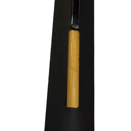 A black rectangular pen holder or sleeve with a light wood handle partially inserted, photographed on a plain white surface.