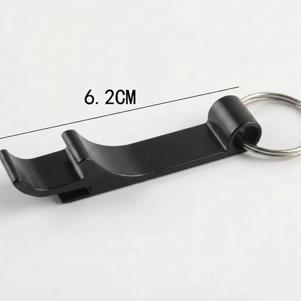 A black metal keychain tool with a silver key ring, shown on a white background with dimension labels indicating 6.2 cm length and 1.