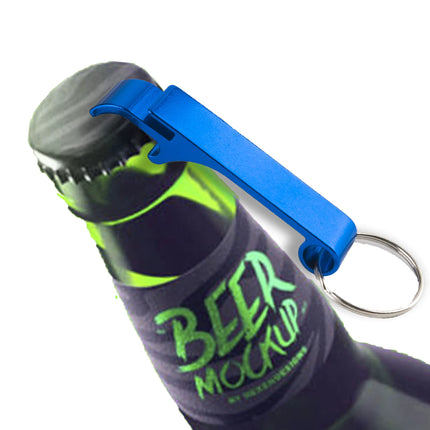 A bright blue bottle opener keychain shown in use, positioned over the cap of a dark bottle with a neon green label that reads 'BEER MOCKUP'.