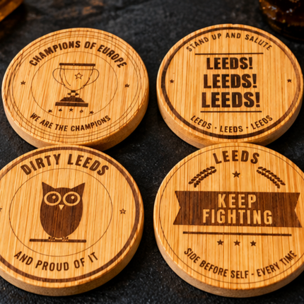 A collage showing wooden bottle opener coasters and matching bottle caps being used on a bar counter, with a hand holding a bottle opener attached to a glass bottle. The coasters are engraved with beer-themed phrases such as 'LEEDS! LEEDS!', 'KEEP FIGHTING', and owl logos, and one coaster is shown with a metal opener bit exposed.