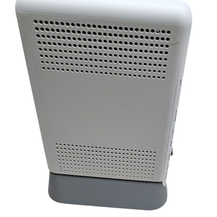 A white electronic device with a perforated grille on the front and a dark gray base, shown against a plain white background.